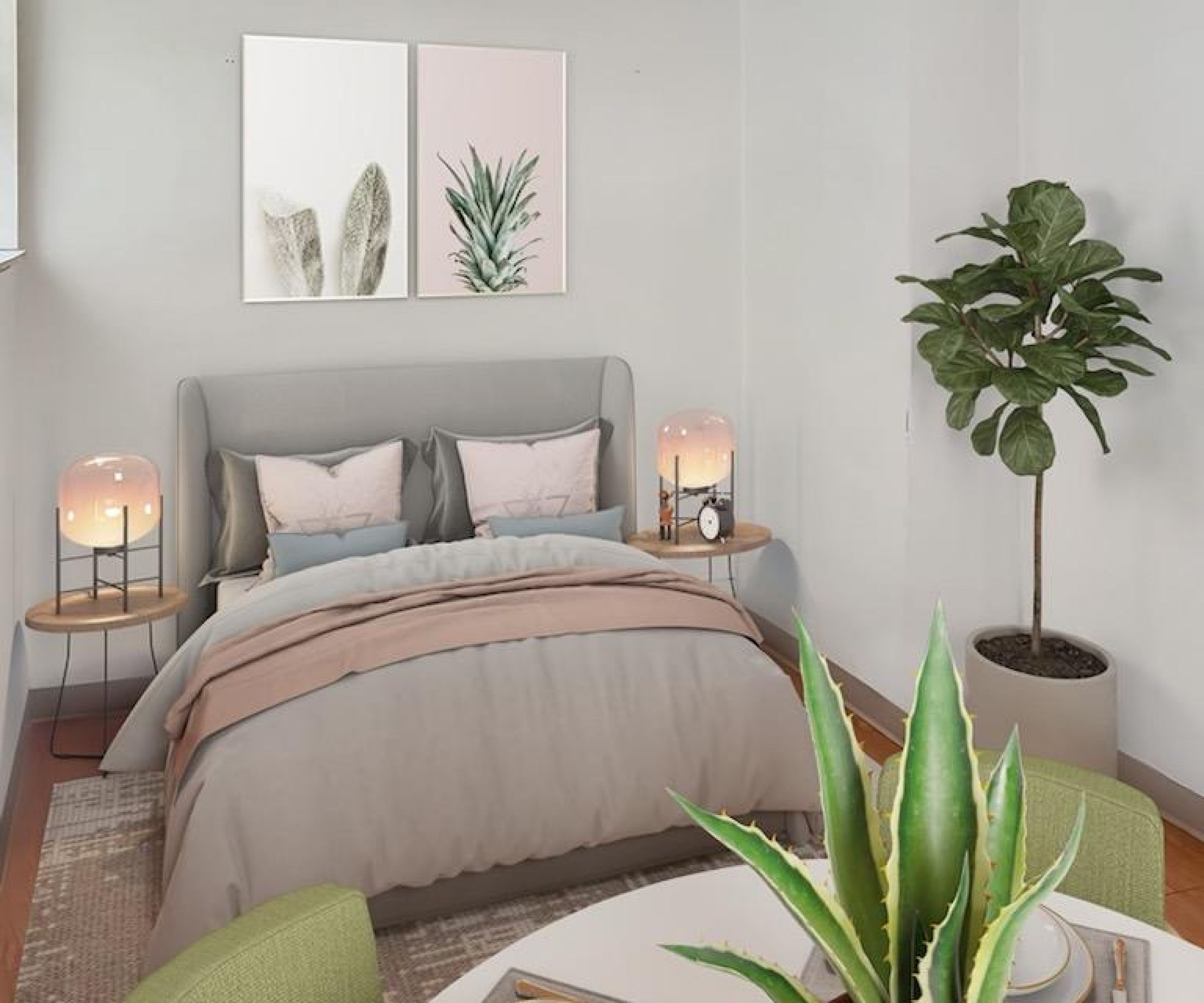 Aeon Affordable Homes and Community Cozy bedroom in affordable apartment homes with a bed, wall art, potted plants, a small dining table, and soft lighting from bedside lamps.