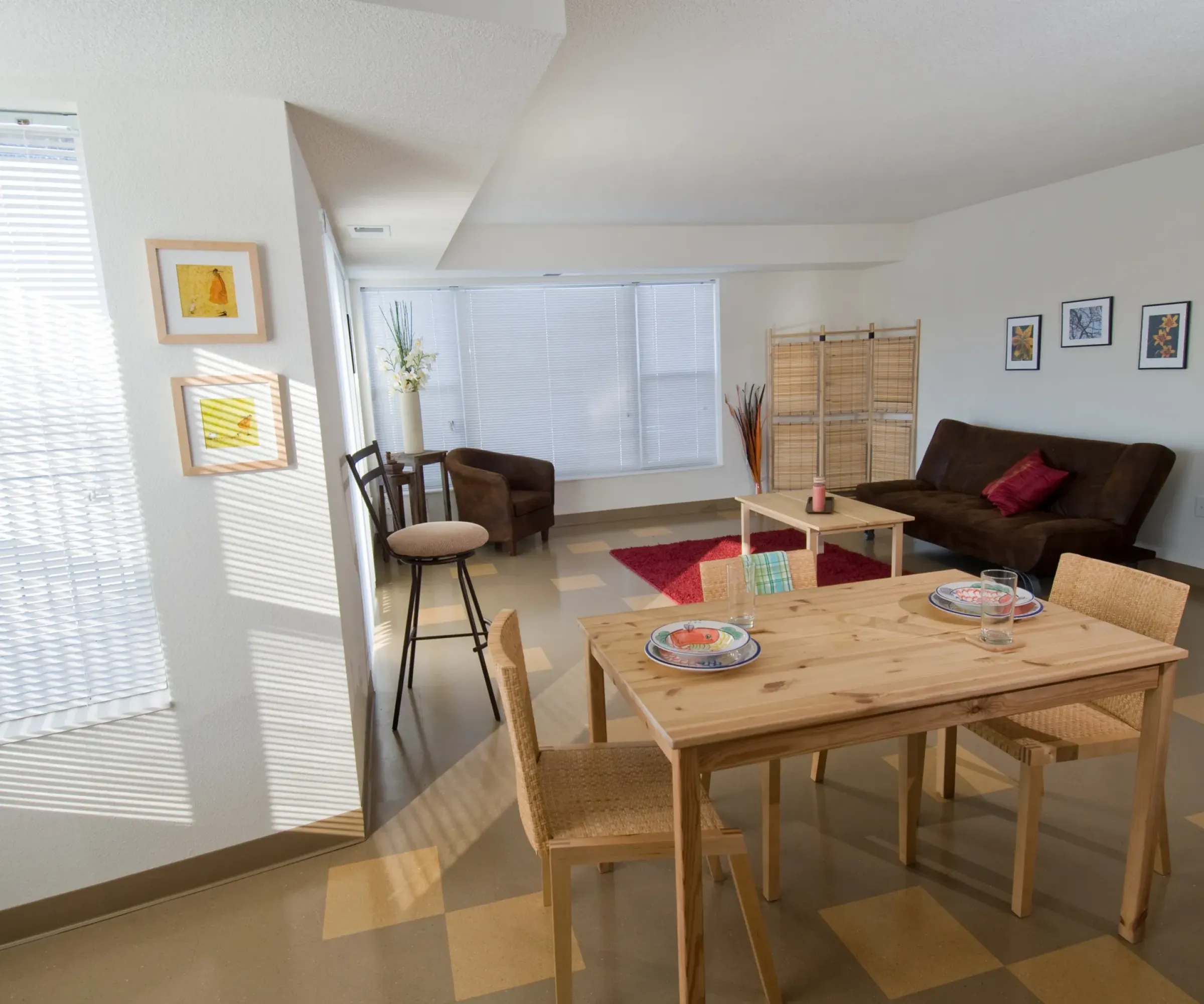 Aeon Affordable Homes with The Wellstone community apartment interior, dining area, and living room with abundant natural light