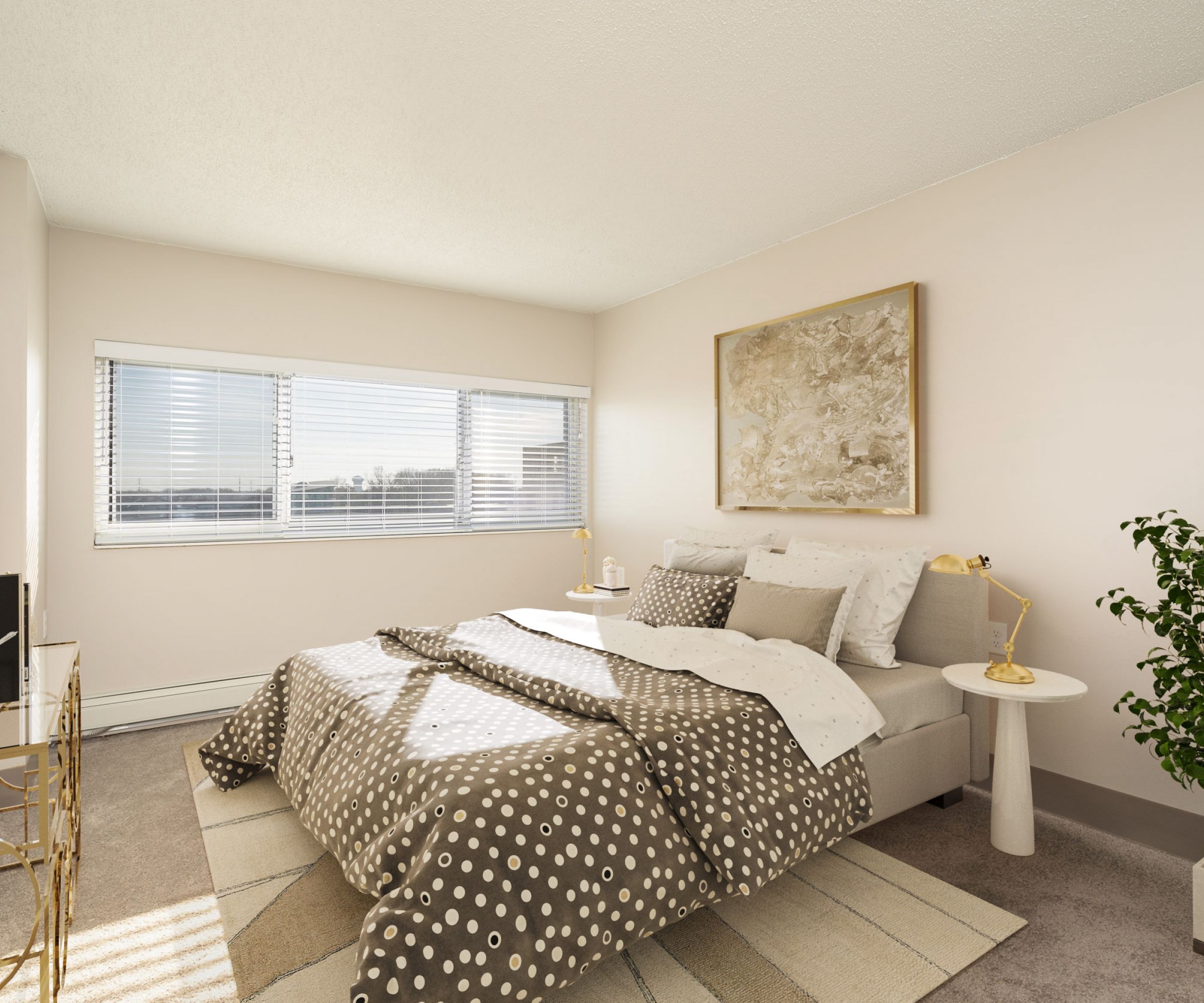 Aeon Affordable Homes and Community A cozy bedroom in affordable apartment homes, featuring polka dot bedding, sunlight through the window, a plant, and abstract wall art.