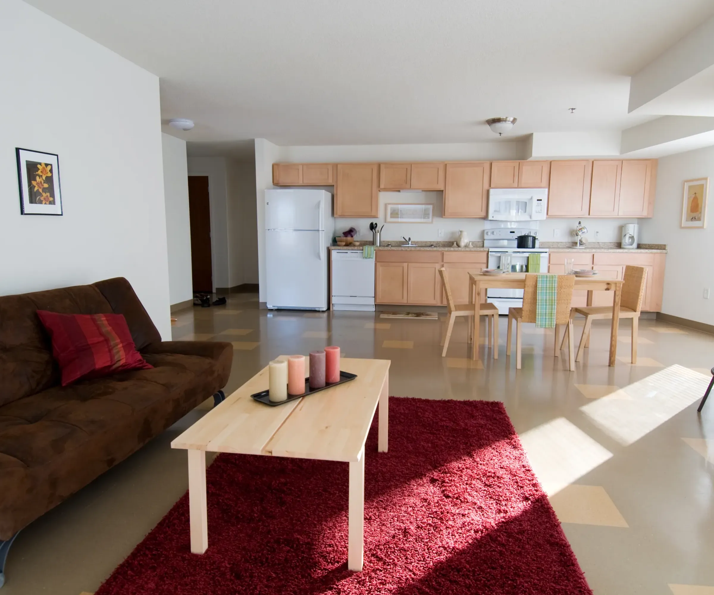 Aeon Affordable Homes with The Wellstone community apartment interior, kitchen, dining area, living room with abundant natural light