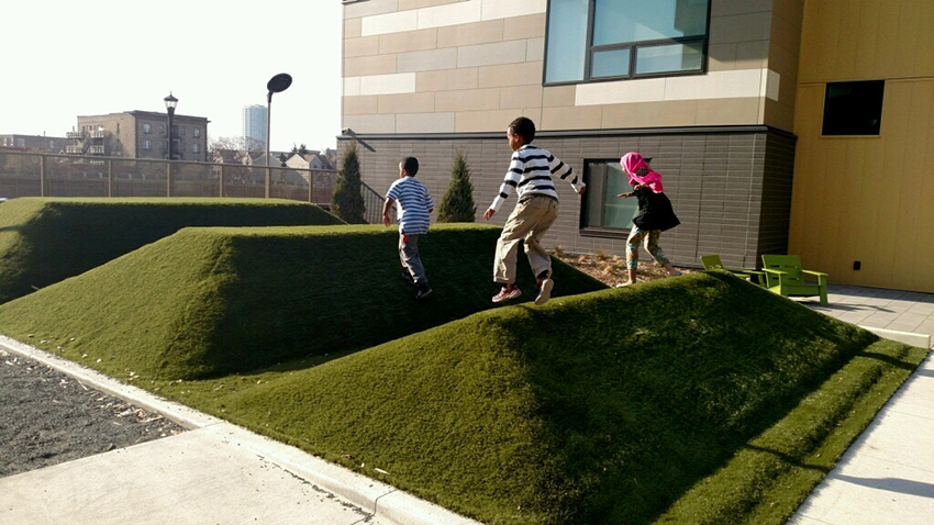 Children playing outside The Rose, an Aeon community designed with sustainability in mind